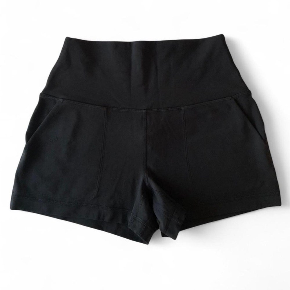 lululemon Black High-Waist Performance Shorts with pockets.